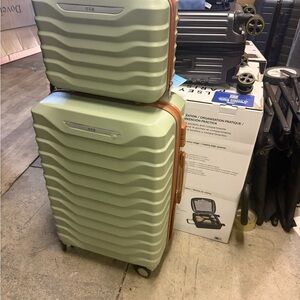 Green Suitcase with Brown Accents